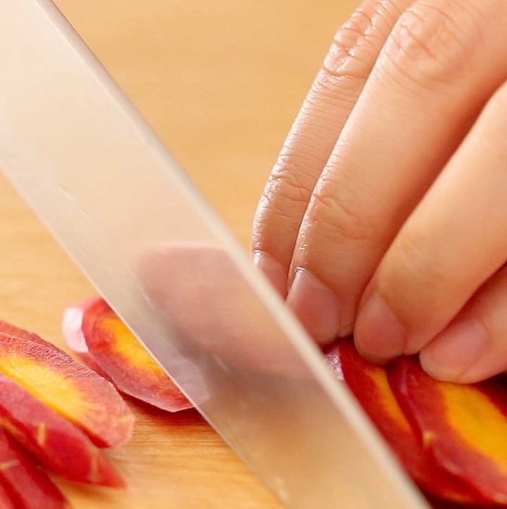 <strong>②</strong> fan out carrot slices to easily cut into ½" sticks