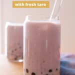Two glasses of taro boba on a wood table with text that reads "Taiwanese taro boba – with fresh taro" and "thesoundofcooking.com"