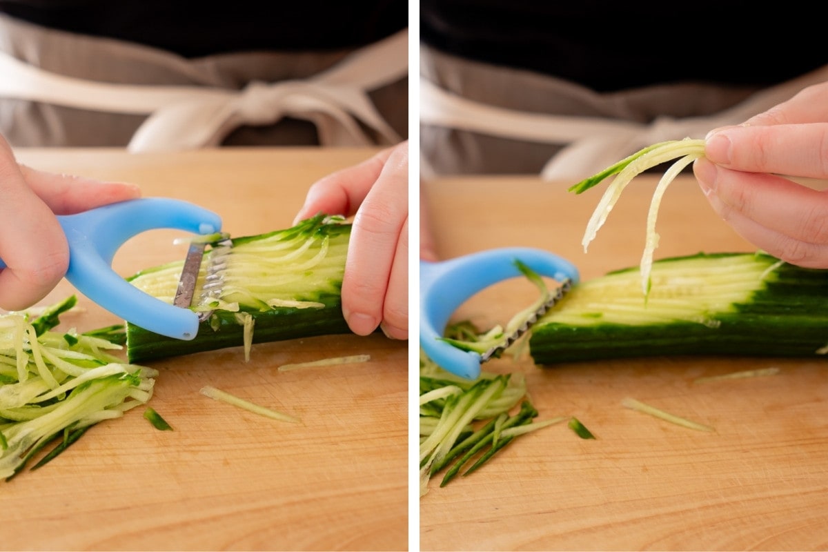 Cindy using an Asian julienne peeler on half of a cucumber on the left and holding up a few thin slices of the cucumber (shown to be slightly thinner than matchstick-size) on the right.