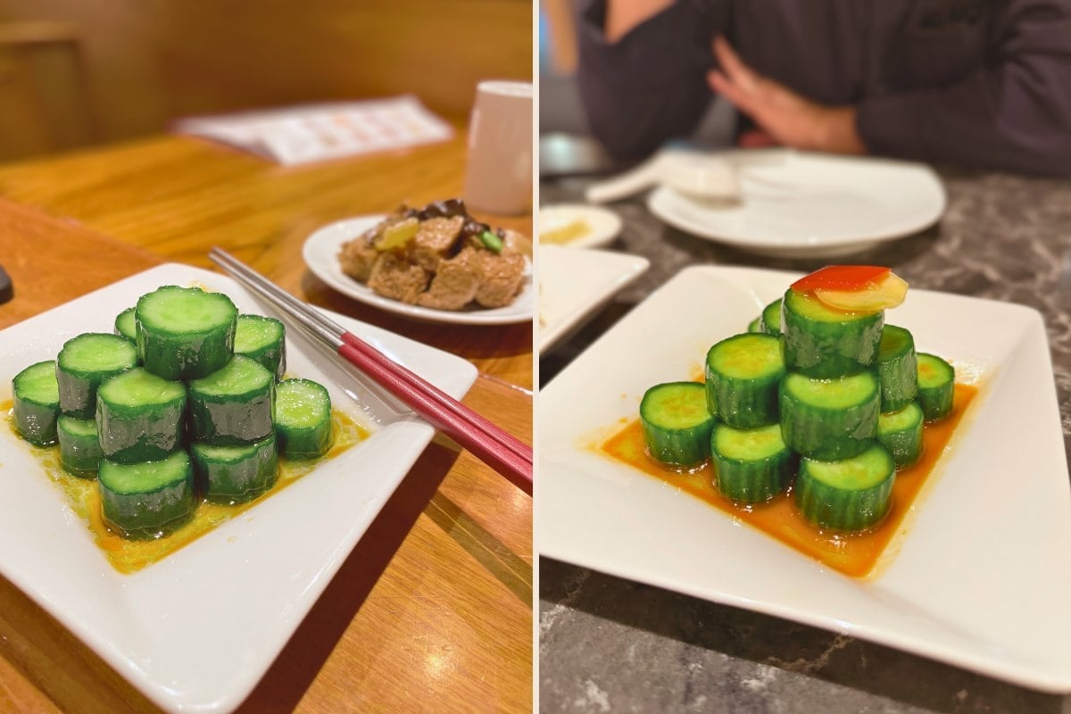 Two plates of Din Tai Fung cucumber salad stacked in a pyramid shape, served with sauce; The plate on the left is from the SOGO Taipei, Taiwan restaurant location and the one on the right is from a US location.